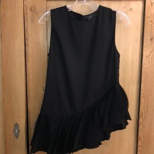 Asymmetrical ruffle bottom fitted sleeveless top